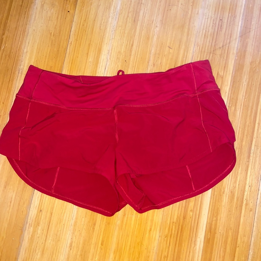 Red Lululemon shorts